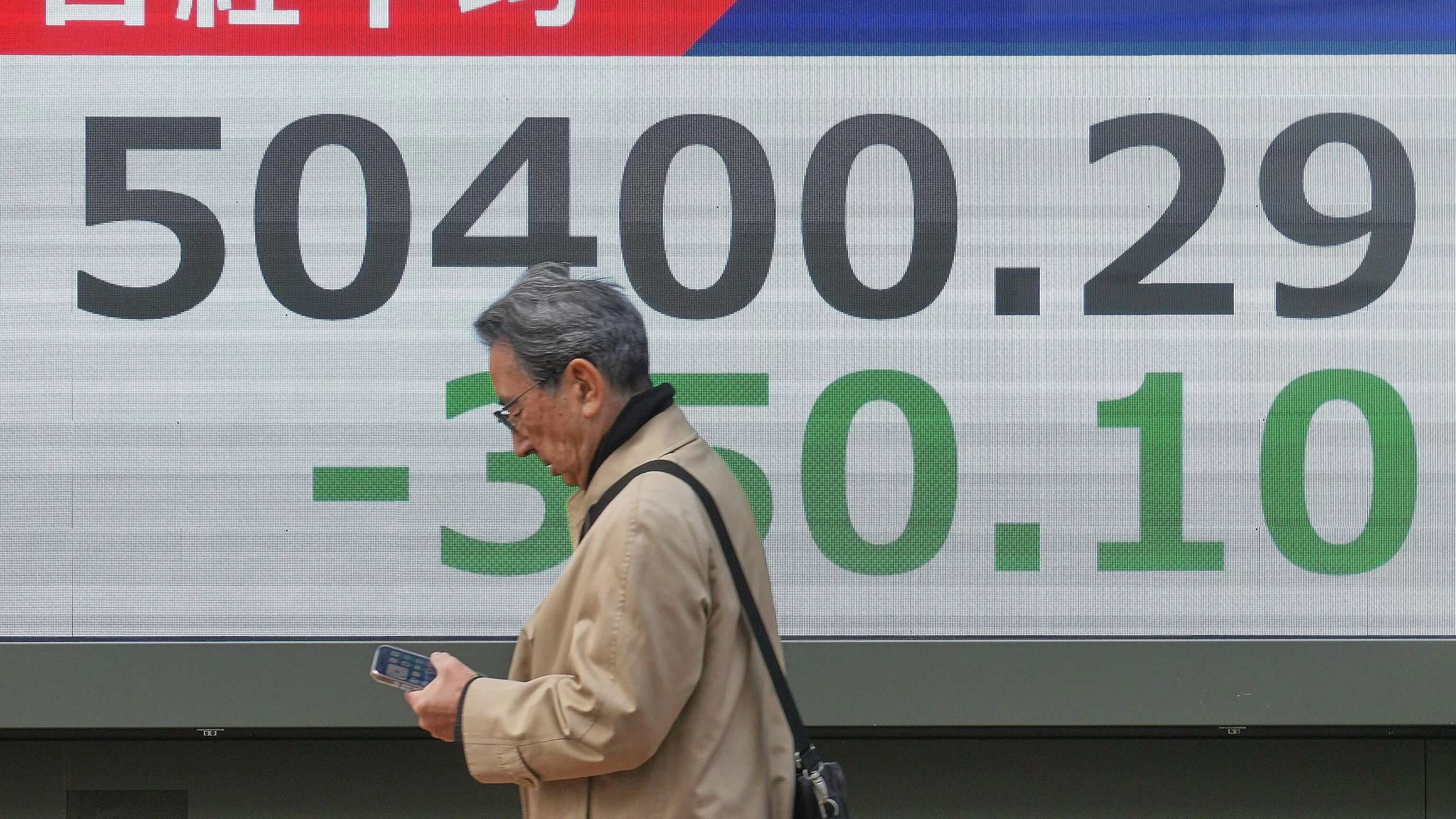 World shares are mostly lower in quiet holiday trading as China stages war drills near Taiwan