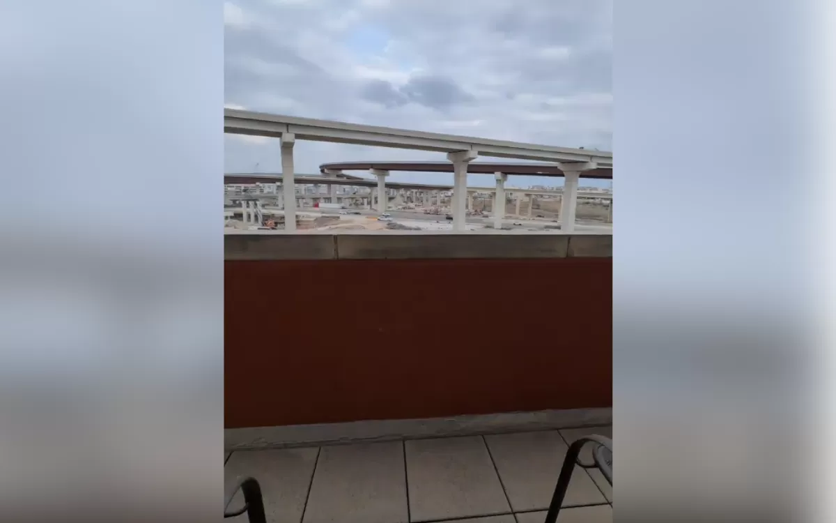 Woman Goes on Romantic Trip With Boyfriend—Laughter at View From Hotel Room
