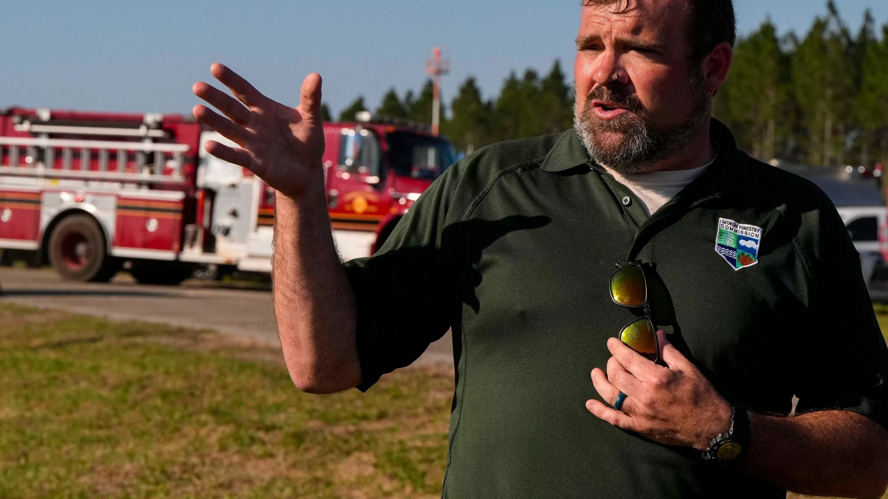 Southern US wildfires force residents to flee, leaving them unsure if their homes are standing