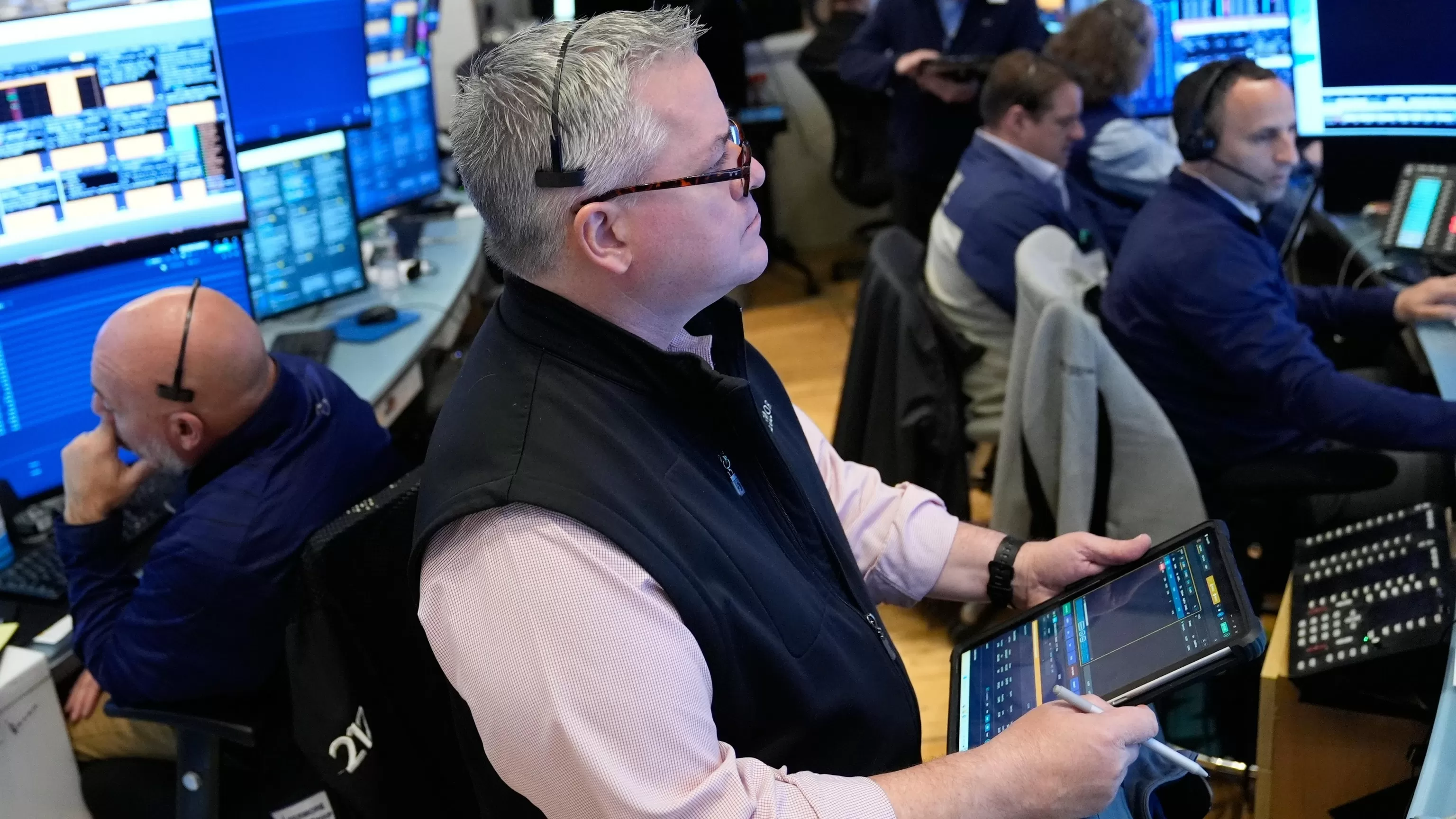 Oil prices jump and stocks are mixed as the US-Iran standoff keeps the Strait of Hormuz in limbo